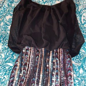 Dress big at top, tight at the bottom